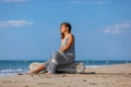 YOUNG WOMAN ON A BEACH Royalty Free Stock Photo