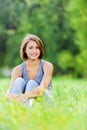 Young woman sitting grass Royalty Free Stock Photo