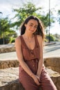 Young woman sitting looking at the camera Royalty Free Stock Photo