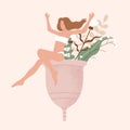 A young woman sitting on a menstrual cup with flowers and leaves. Zero waste device for women in critical days