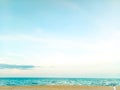 Young woman sitting on a rock, gazing in the distance, looking in the sea.loneliness.alone.relax concept idea for holiday Royalty Free Stock Photo