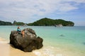 Young woman sitting on a rock at Wua Talab island, Ang Thong Nat Royalty Free Stock Photo