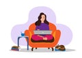 Young woman sitting on sofa and working on laptop at home. Home office concept. Female freelancer, entrepreneur. Modern business. Royalty Free Stock Photo