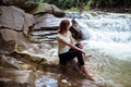 Peaceful Caucasian Traveler Sit at Beautiful Stream