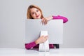 Young woman sitting in the table and using computer Royalty Free Stock Photo