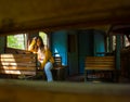 Young woman sitting on a train, sexy young girl sitting on a train, young woman sitting on a chair in train Royalty Free Stock Photo