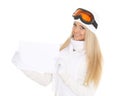Young woman in ski glasses with empty board for the text. Royalty Free Stock Photo