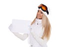 Young woman in ski glasses with empty board for the text Royalty Free Stock Photo