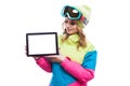 Young woman in ski suit hold empty tablet Royalty Free Stock Photo