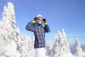 Young woman skier portrait outdoor in winter mountains