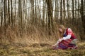 Young woman in Slavic Belarusian national original suit outdoors