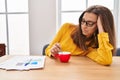 Young woman sleeped drinking coffee at office Royalty Free Stock Photo