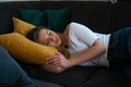 Young Woman Sleeping on Couch Royalty Free Stock Photo