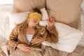 Woman sleeping with eye mask Royalty Free Stock Photo
