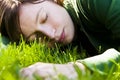 Young woman sleeping on the grass Royalty Free Stock Photo