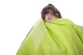 Young woman sleeping under a bedspread