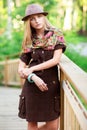 Young woman on small wooden bridge Royalty Free Stock Photo