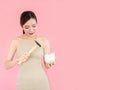 Young woman smashed piggy bank with a hammer Royalty Free Stock Photo