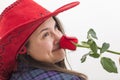 A young woman smelling a rose on white Royalty Free Stock Photo