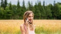 Young woman with a smile on her face talking on mobile phone Royalty Free Stock Photo