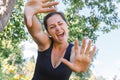 Young woman smiling outdoor. Beautiful brunete girl resting on park or garden green background. Free happy woman at Royalty Free Stock Photo