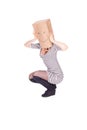 Young woman in smiling paper bag on head