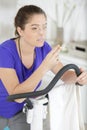 young woman smoking cigarette while doing sports Royalty Free Stock Photo