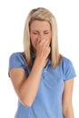 Young woman sneezing Royalty Free Stock Photo
