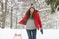 Young woman in snow with sledge Royalty Free Stock Photo