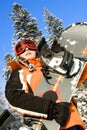 Young woman snowboarder