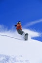 Young woman snowboarding Royalty Free Stock Photo