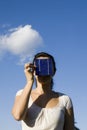 Young woman with a solar cell Royalty Free Stock Photo