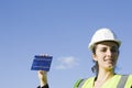 Young woman with a solar cell Royalty Free Stock Photo