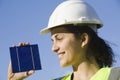 Young woman with a solar cell Royalty Free Stock Photo
