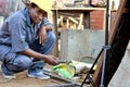 Young woman welder at work.