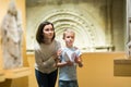 Woman and boy visiting sculptures exhibition Royalty Free Stock Photo