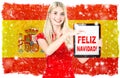 Young woman spainish national flag Merry Christmas Feliz Navidad Royalty Free Stock Photo