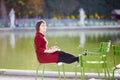 Young woman in Tuileries garden of Paris, France Royalty Free Stock Photo