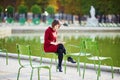 Young woman in Tuileries garden of Paris, France Royalty Free Stock Photo