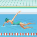 Young woman in sports swimsuit swims in the pool front crawl Royalty Free Stock Photo