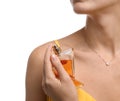 Young woman spraying perfume onto skin Royalty Free Stock Photo
