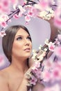 Young woman with spring flowers Royalty Free Stock Photo