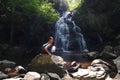 Young woman by Spruce Flats Falls in the Smoky Mountains. Royalty Free Stock Photo