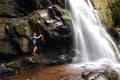 Young woman by Spruce Flats Falls in the Smoky Mountains. Royalty Free Stock Photo