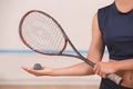 Young woman squash player exercise game in the gym Royalty Free Stock Photo