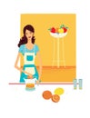 Young woman squeezes fresh citrus juice on a hand-held juicer Royalty Free Stock Photo