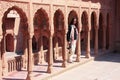 Young woman standing on courtyard terrace, Junagarh fort, Bikaner, India Royalty Free Stock Photo