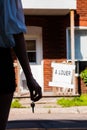 Young Woman standing in front of her new apartment