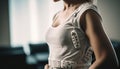 young woman standing in gym, focusing on exercising equipment generated by AI