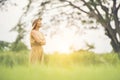 Young woman standing happy time in grass Royalty Free Stock Photo